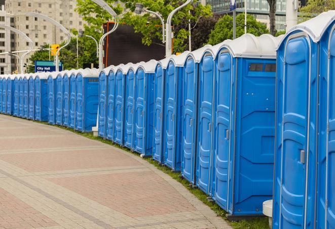 a row of portable restrooms at a fairground, offering visitors a clean and hassle-free experience in kent